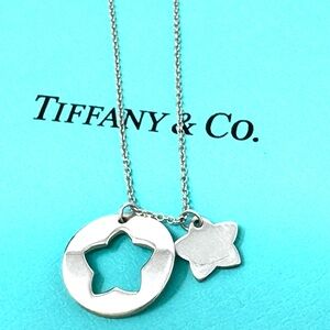 Authentic Tiffany &Co Stencil Cutout Double Star Pendant Necklace.
